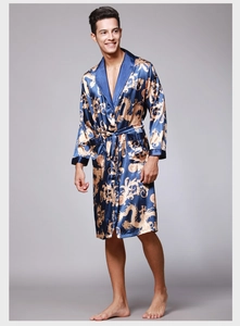 Detail view of men's blue silk satin bathrobe with golden dragon and baroque prints