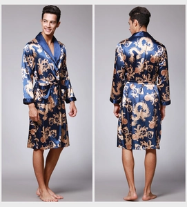 Detail of navy silk bathrobe for men featuring intricate golden dragon print and shawl collar
