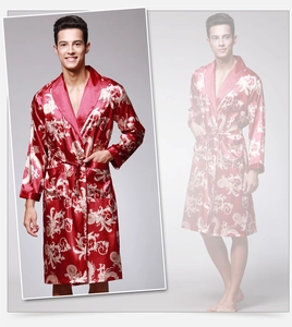 Detail of red silk bathrobe for men featuring golden dragon patterns and a shawl collar