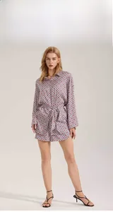 Detailed view of women's vintage geometric print pajama set with long sleeves and shorts