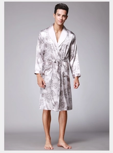 Close-up of silver-grey satin robe featuring vintage floral patterns and shawl collar