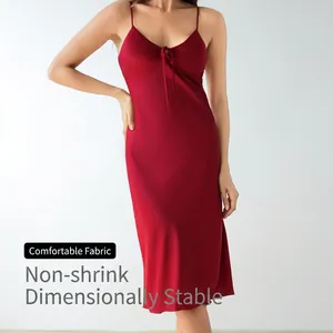 Red satin slip nightgown with V-neck and bowtie detail for a silky summer lounge look