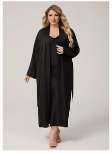 Detailed view of the smooth black satin fabric and texture of this elegant robe set