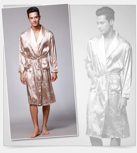 Detail of champagne gold silk robe for men featuring vintage European scroll pattern