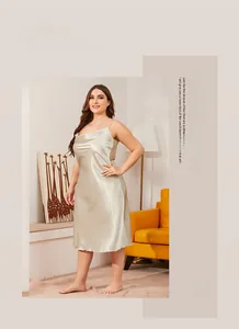 Champagne gold satin sleepwear dress featuring slim straps and a glossy silk finish