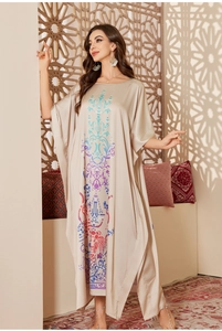 Luxurious champagne satin robe with intricate vertical floral print and batwing sleeves