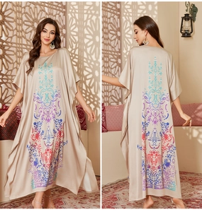 Luxurious satin kaftan for women featuring silk-like fabric and ethnic floral prints