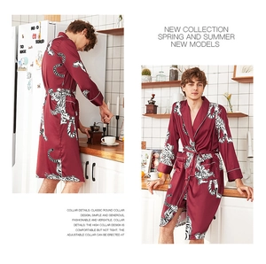 Detail of burgundy silk robe for men featuring white tiger prints and elegant kimono collar