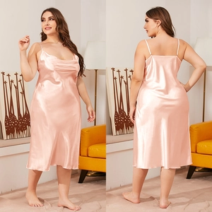 Pale pink satin plus size slip nightgown with draped neckline and smooth glossy finish
