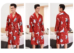 Three-way view of a red silk satin men's bathrobe with white crane prints and belted waist