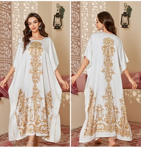 Detailed front and back view of a white satin kaftan with gold embroidery and loose sleeves