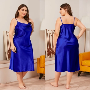 Detail of navy blue satin slip dress featuring elegant draped cowl neck and silk texture