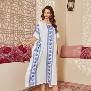 Elegant plus size satin caftan with blue floral print and loose long silhouette