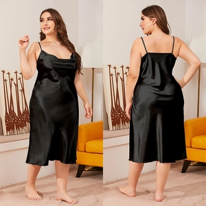 Detailed view of plus size black satin nightgown with elegant drape and V-neckline
