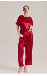 Detail view of dark red ice silk pajama set with short sleeve top and long pants