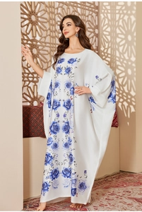 Elegant white satin kaftan dress featuring a vertical blue rose print and loose fit