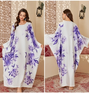 Detail of floral printed satin kaftan nightgown with long drape and relaxed fit