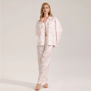 Women's 3-piece satin pajama set with pink heart print, long sleeve top and pants