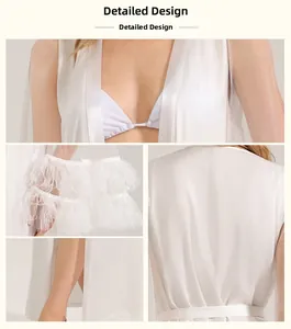 Detail showing the white chiffon robe with fluffy feather cuffs and delicate fabric texture