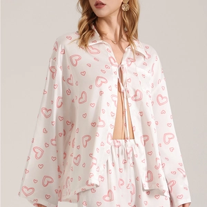 Three-piece ivory satin pajama set for women with pink heart print and long sleeves