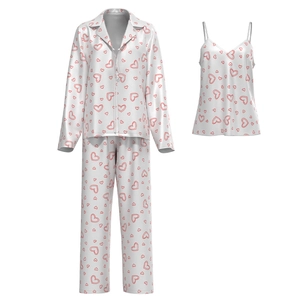 Three-piece satin pajama set featuring red heart prints with camisole and long sleeve top