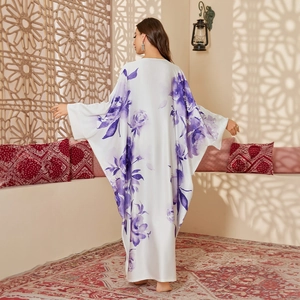 Elegant white satin caftan with purple floral print and wide sleeves back view