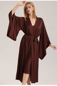 Detailed view of deep brown satin robe with wide sleeves and elegant silk-like texture