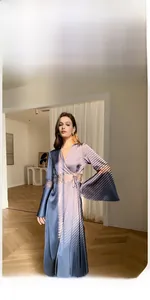 Detail of French satin nightgown showing elegant lace patchwork and bell sleeves