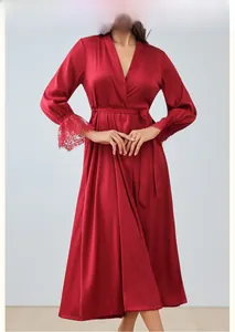 Detailed shot of dark red satin robe featuring elegant lace cuffs and waist tie detail
