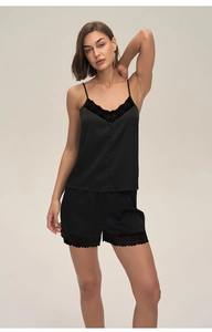 Detail of black satin pajama set with V-neck lace trim and decorative front buttons