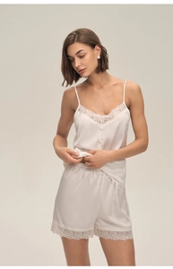 Detailed view of white satin camisole set with delicate eyelash lace and decorative buttons