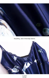 Detail of satin fabric texture and elegant lace V-neckline with delicate crane print