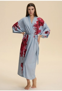 Detail of light blue satin robe with red peony print and matching waist tie belt