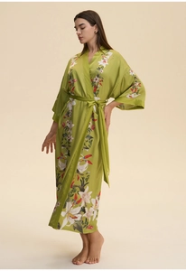 Detailed macro view of the satin floral print robe featuring elegant wide flared sleeves