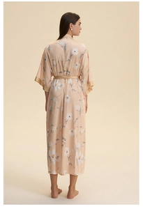 Detail of floral printed satin robe with waist tie and smooth silk piping on cuffs