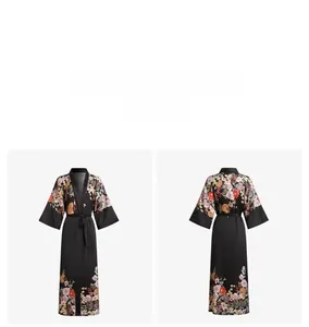 Front and back view of long black satin floral robe with wide sleeves and waist tie