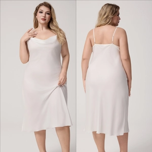 Detail of champagne satin plus size slip dress featuring elegant cowl neck and thin straps