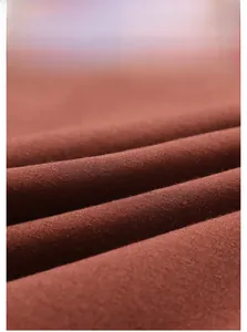 Macro shot of brown cloud cotton fabric with twill weave texture for men's robes
