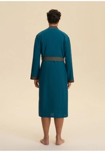 Rear view of long sleeve robe for men with geometric floral pattern on cuffs and belt