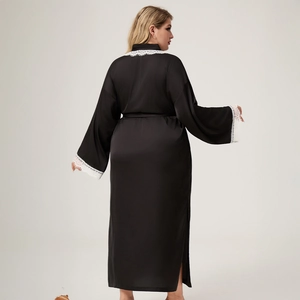 Back view of long black satin robe with white lace trim on sleeves and hem for women