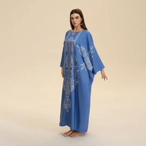 Elegant blue kaftan robe with white ethnic floral print and loose batwing sleeves