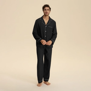 Men's black cotton lounge pajama set with long sleeves and classic white piping detail