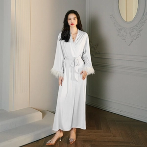 Elegant white satin robe for women with long sleeves and ostrich feather trim details