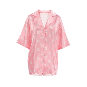 Pink satin short-sleeve pajama top with white M-letter monogram and silky smooth finish