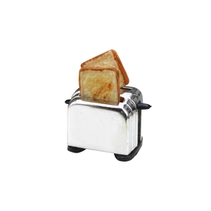 Miniature silver dollhouse toaster model with two slices of realistic toast bread