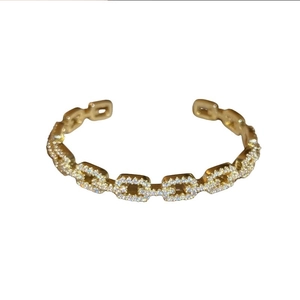 Gold plated chain link open bangle with sparkling cubic zirconia for a luxury look