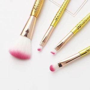 4pcs mermaid tail makeup brush set with gradient pink bristles and gold fish scale handles