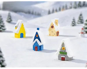 Detailed set of 4 miniature snowy resin villas with colorful roofs and Christmas snowman