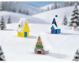 Detailed view of colorful resin Christmas village houses on a snowy miniature landscape