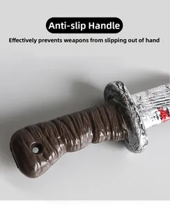 Detail of non-slip prop knife handle with realistic blood stains and antique silver guard